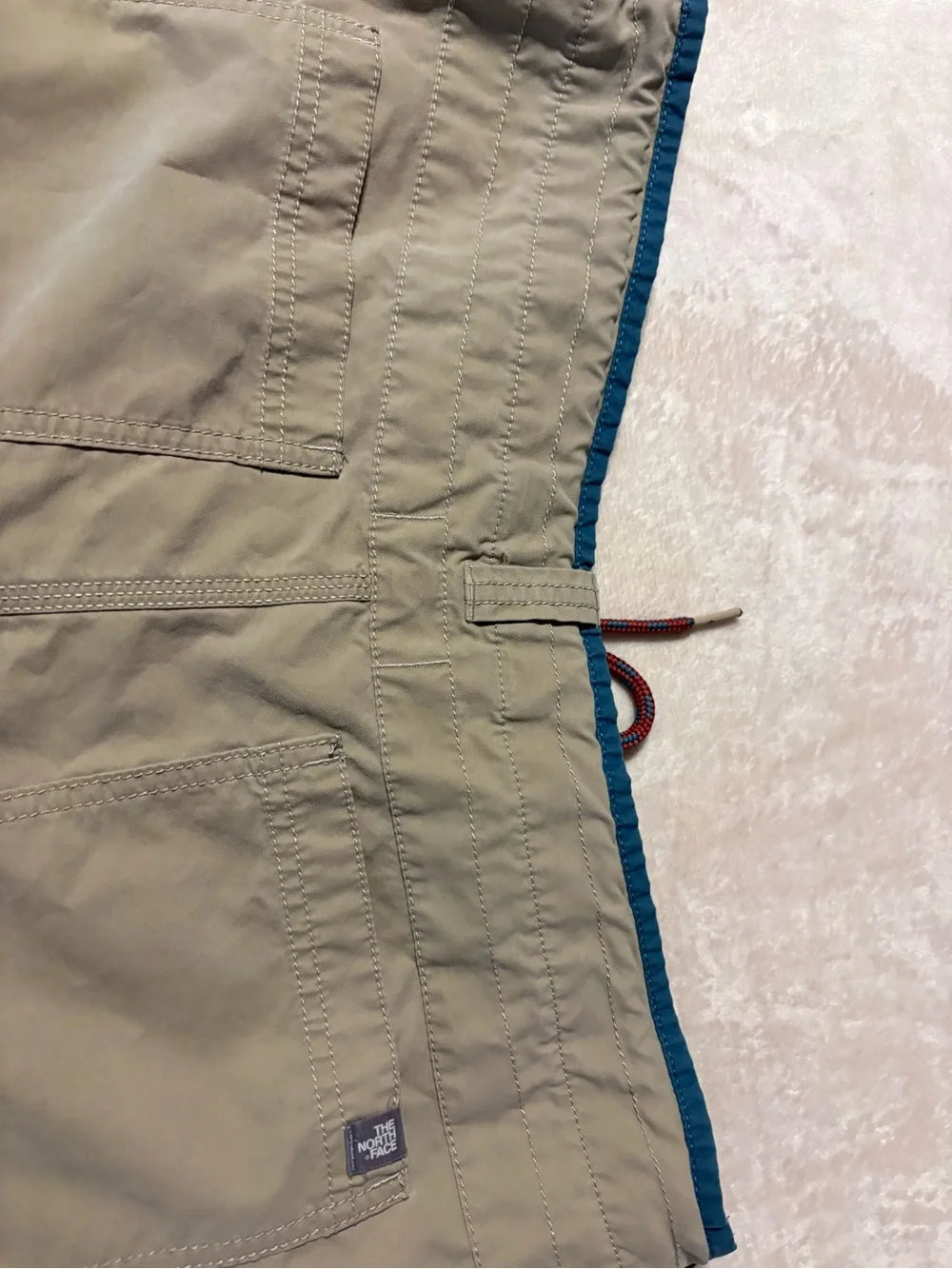 The North Face Khaki Shorts with Teal Trim and Red Drawcord